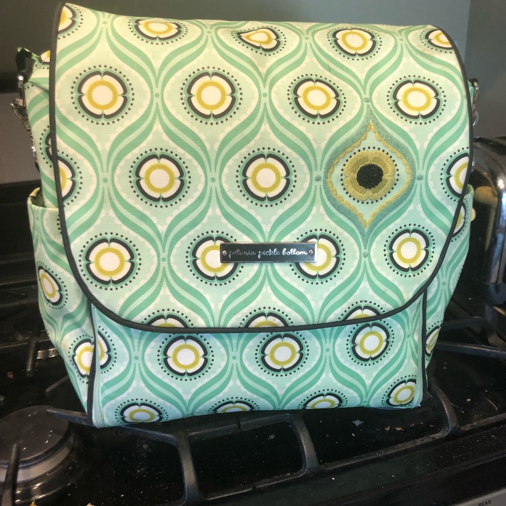 Bright green Petunia Pickle Bottom diaper bag
